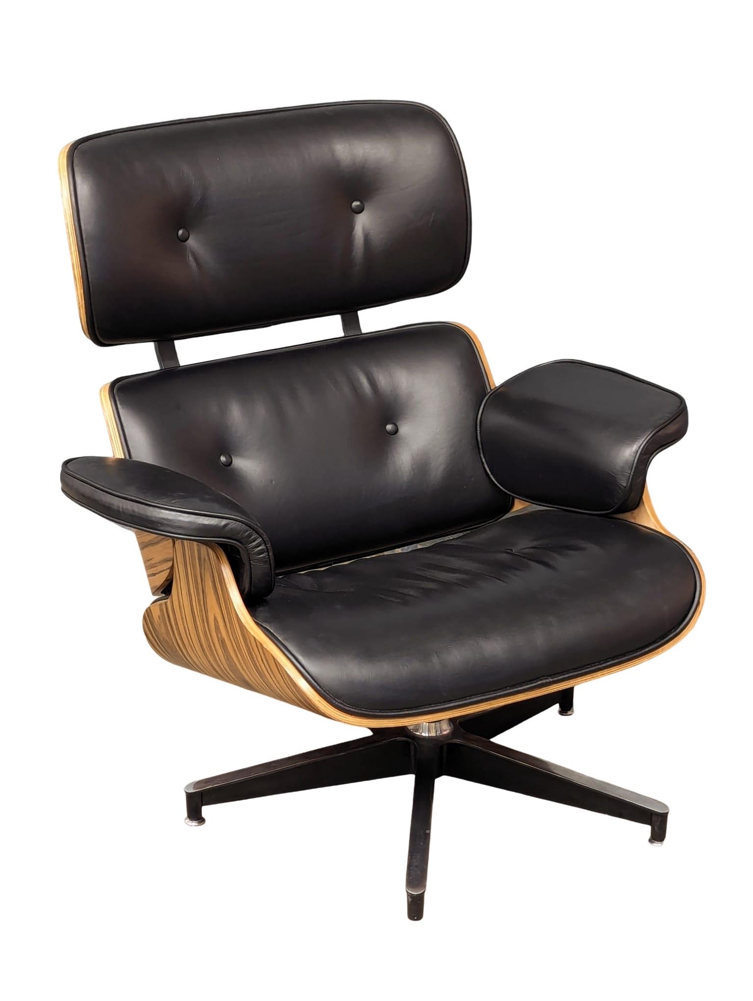 A Charles & Ray Eames Style swivel chair and ottoman. - Image 5 of 8