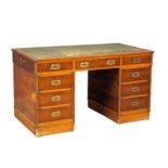 A Campaign style yew wood pedestal desk with leather top. 135x74x78cm