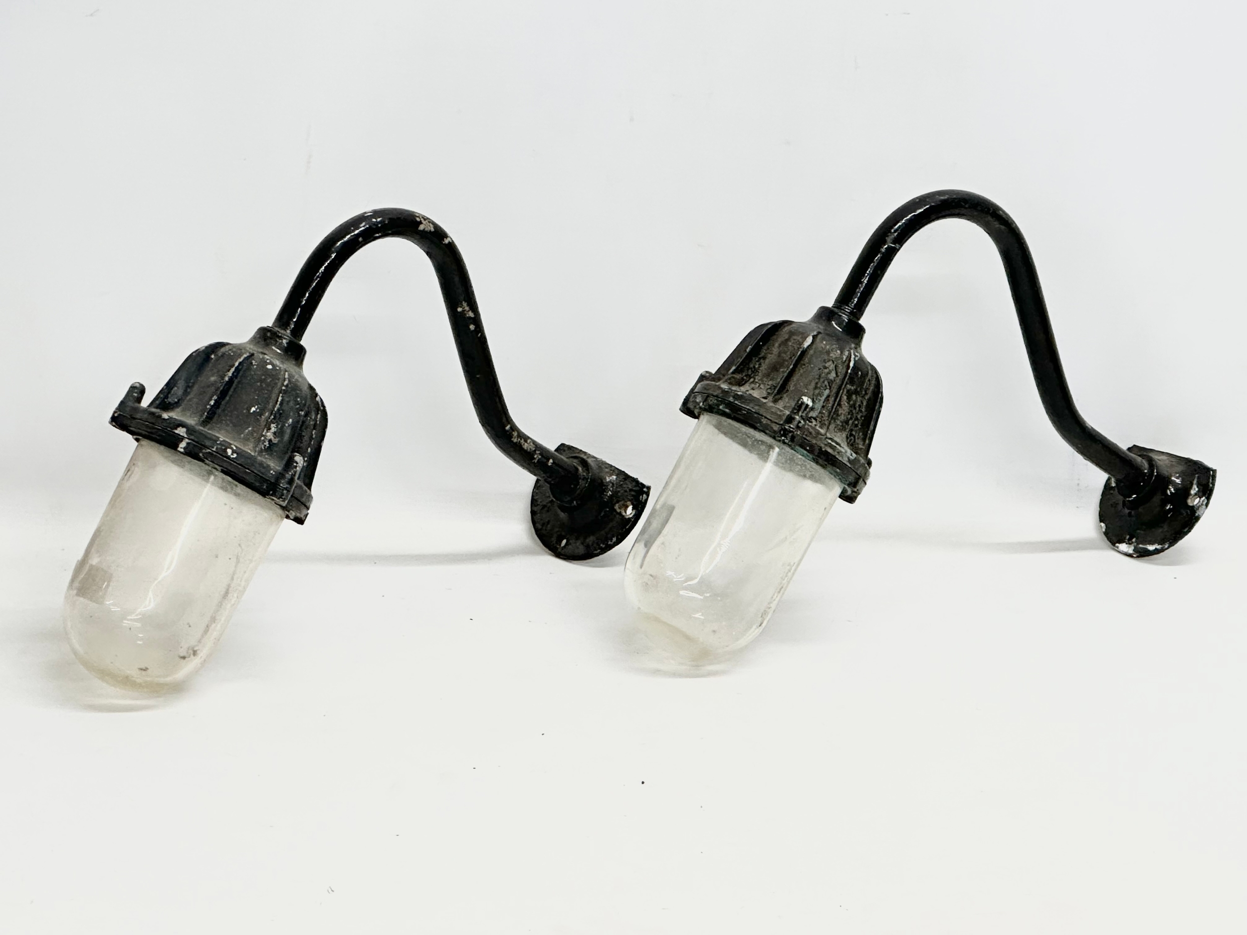 A pair of vintage industrial swan neck wall lights. 35x35cm