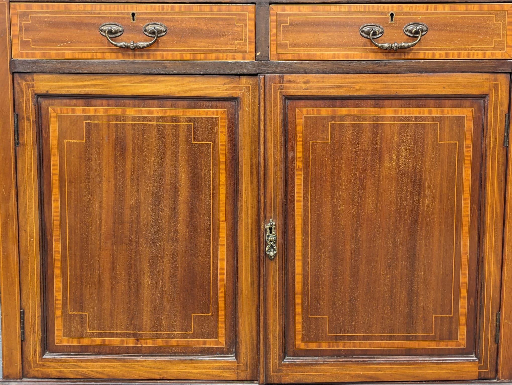 An Early 20th Century Sheraton Revival inlaid mahogany bookcase. Circa 1900. 91x41x200cm - Image 5 of 9