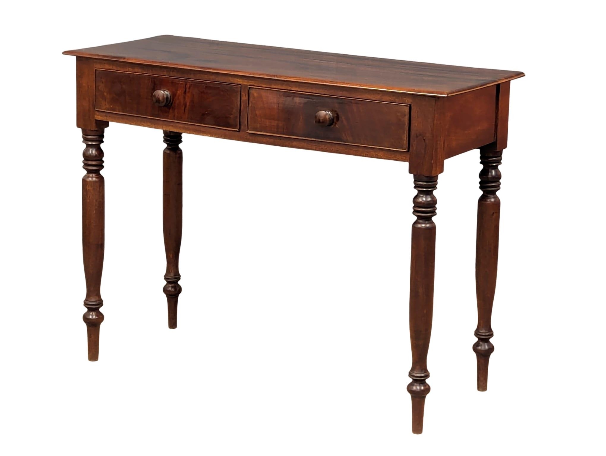 A Victorian mahogany 2 drawer hall table, circa 1860-70. 103cm x 41cm x 78cm