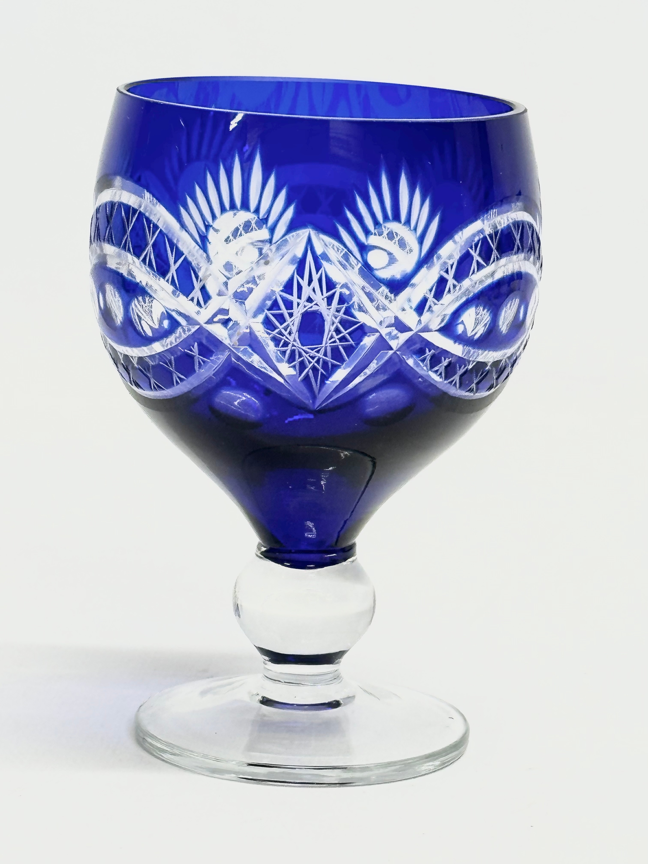 A 7 piece 20th Century Bohemian blue crystal drinks set. Glasses 11cm. Decanter 29cm. - Image 4 of 5