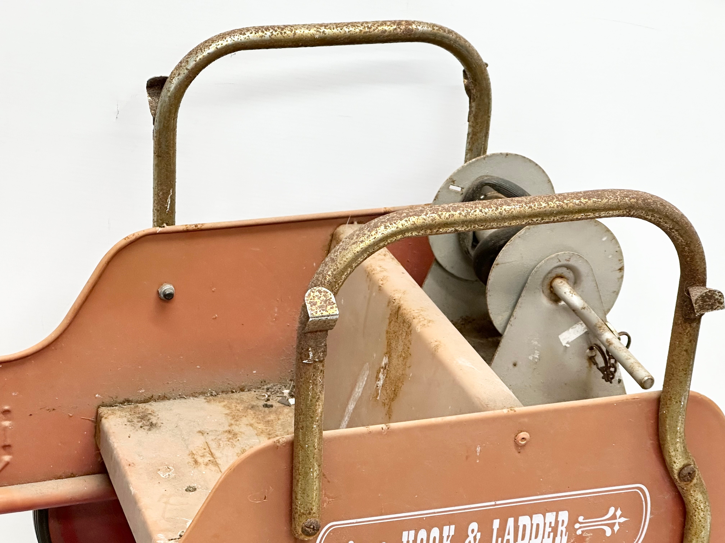 A child’s tin plate fire truck peddle car. 97cm - Image 4 of 6