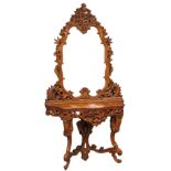 An ornate carved mirror back console table. 107x42x204cm