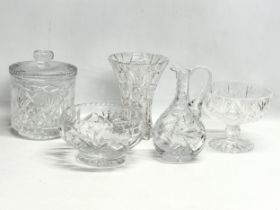 A quantity of crystal. A biscuit barrel with lid 16.5x21cm. Tyrone bowls 20cm.