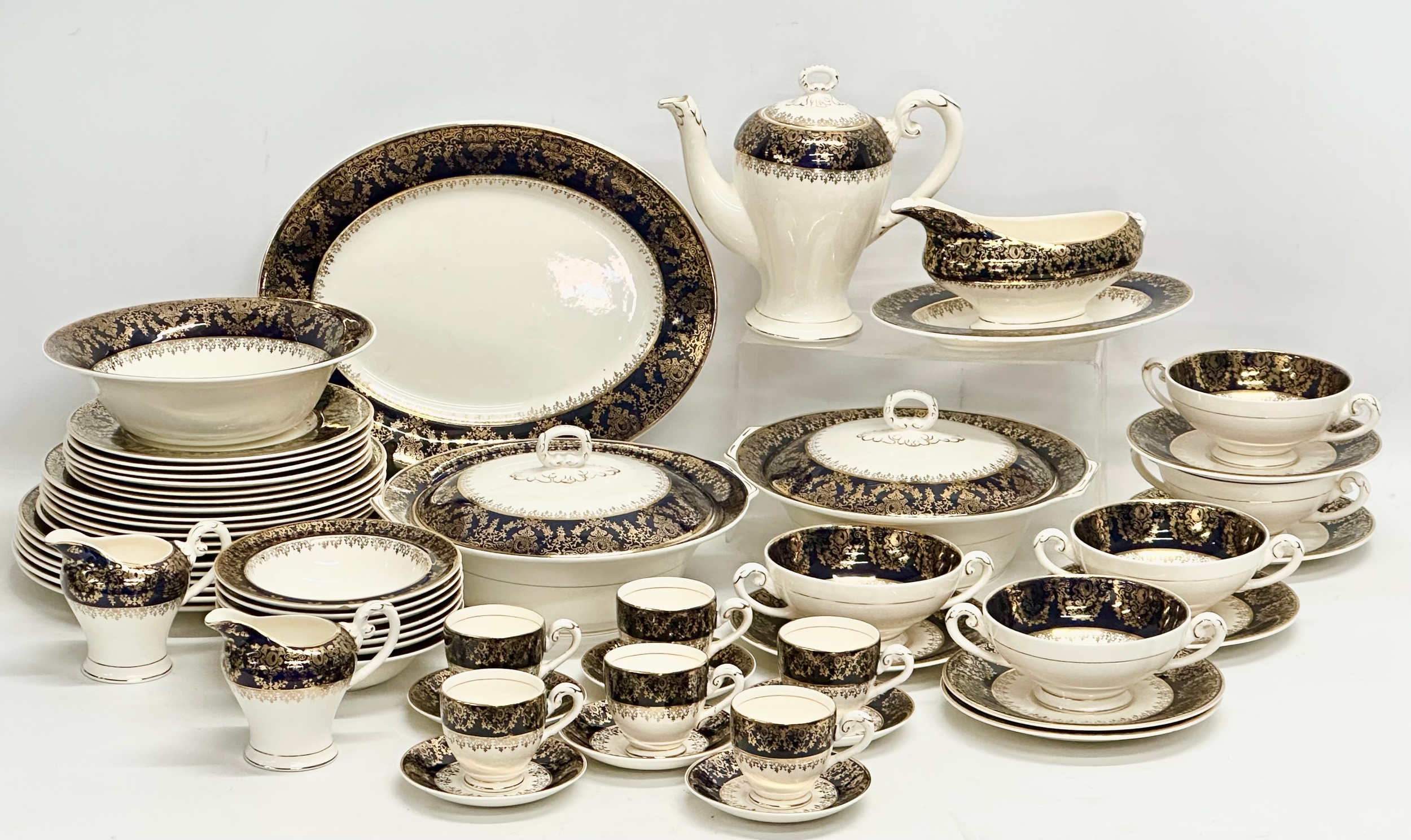 A Mid 20th Century 57 piece dinner service by Myott Son & Co.