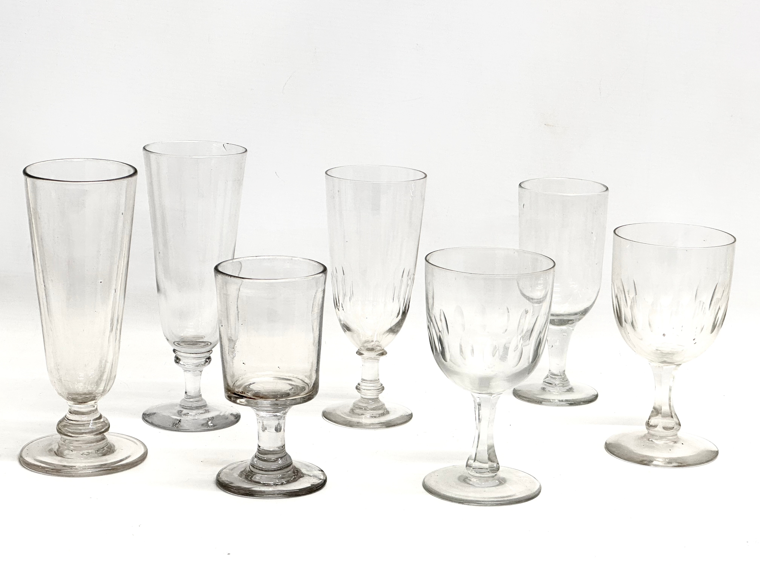A collection of large Mid 19th Century Victorian drinking glasses. 2 Victorian ale glasses 19cm. A