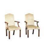 A pair of Early 20th Century Gainsborough style armchairs.