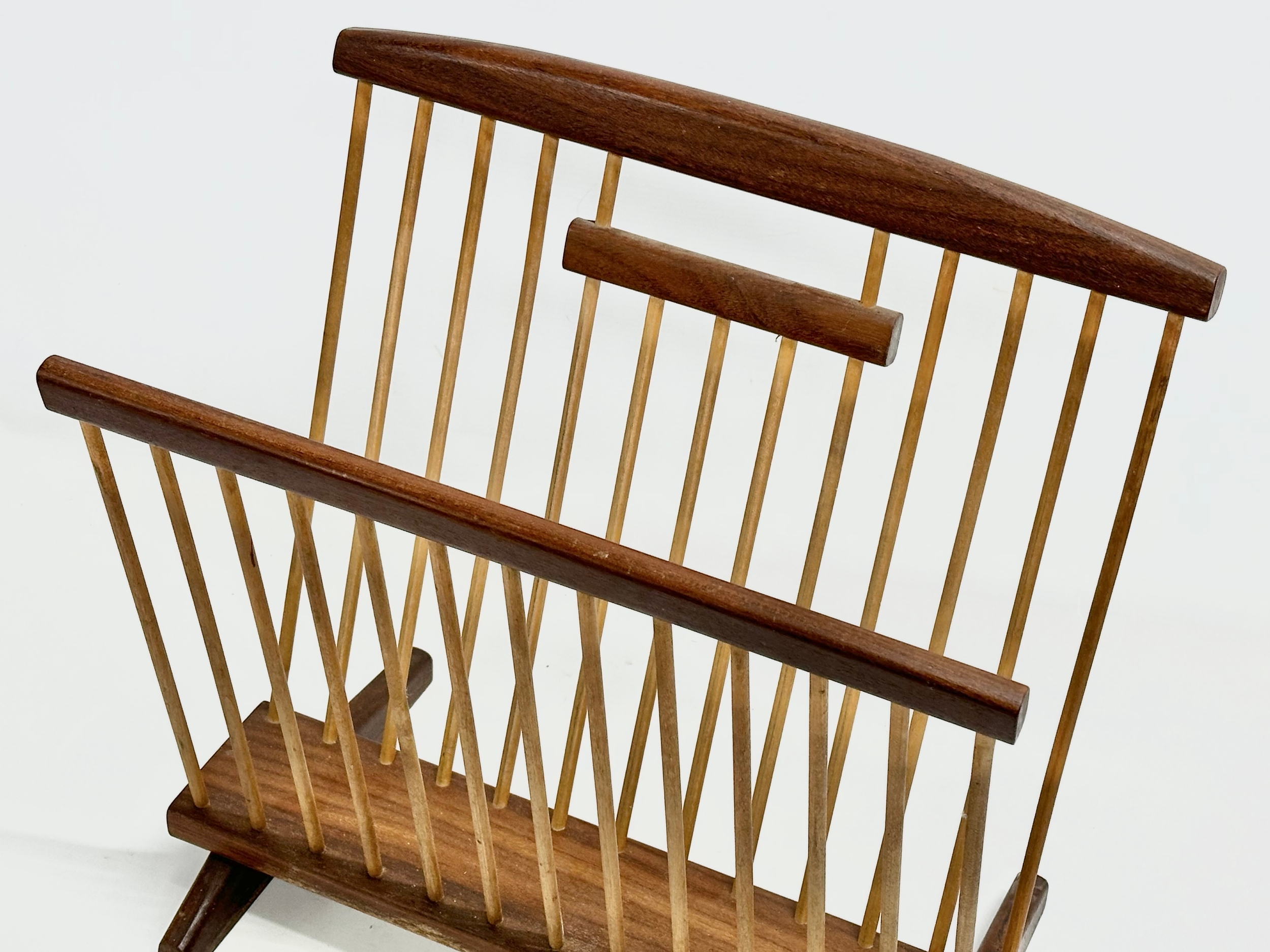 A Mid Century teak magazine rack. 38x22x38cm - Image 2 of 2