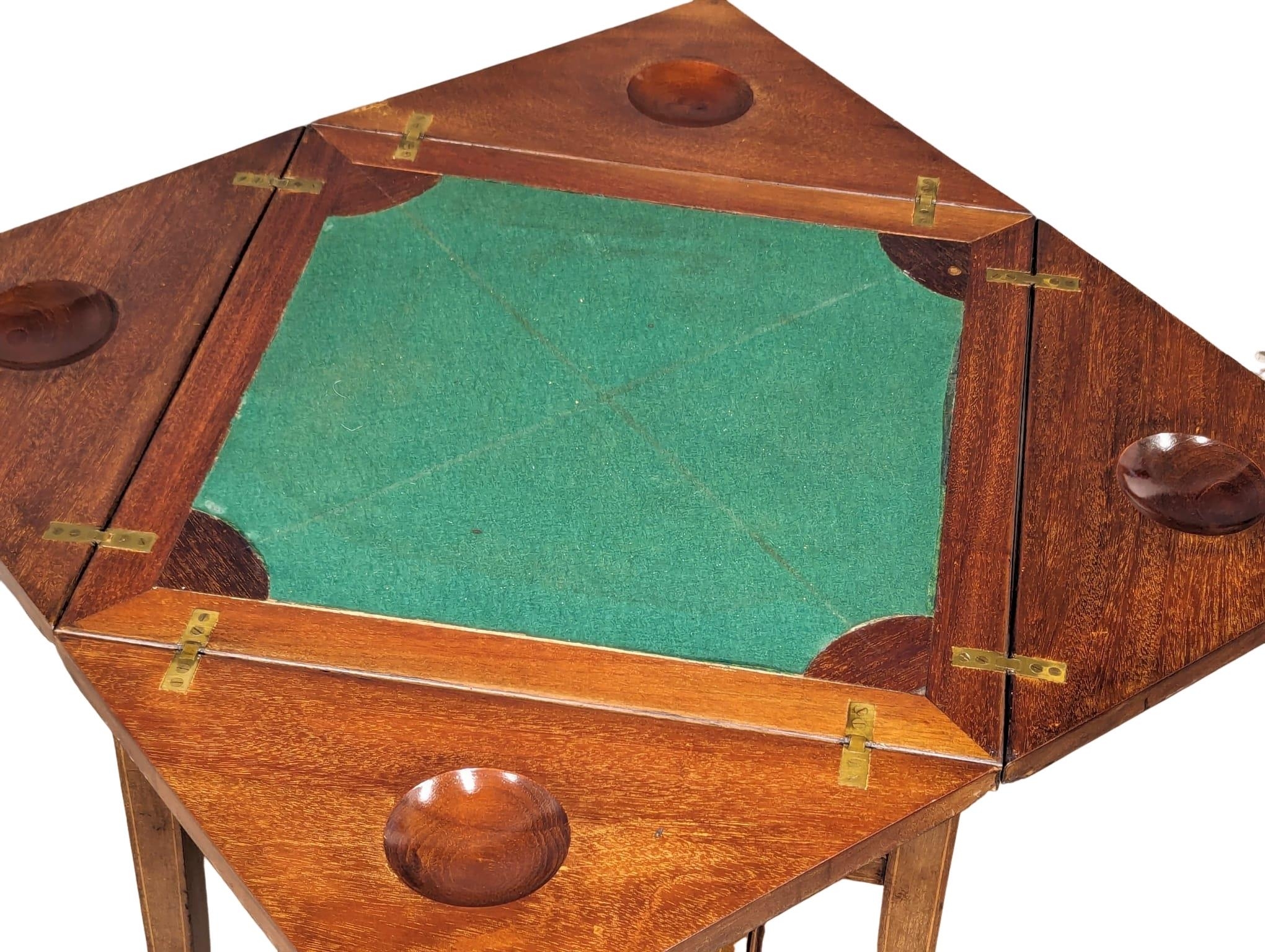 An Edwardian inlaid mahogany envelope turnover games table. 53.5x77.5cm - Image 5 of 8