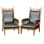 A pair of large Early 20th Century Arts & Crafts oak armchairs. Circa 1900.