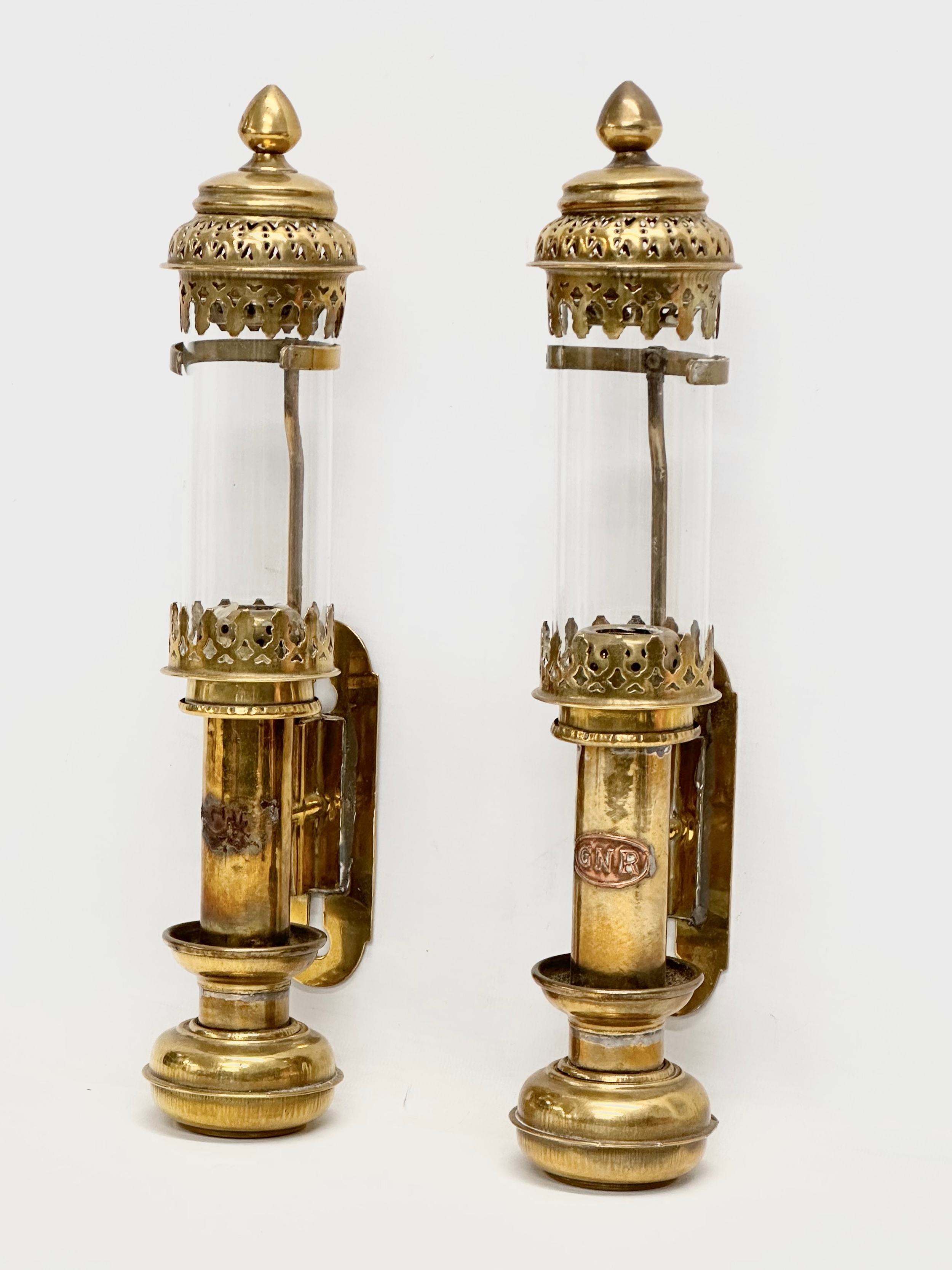 A pair of Early 20th Century Great Northern Railway brass carriage lamps. 35cm