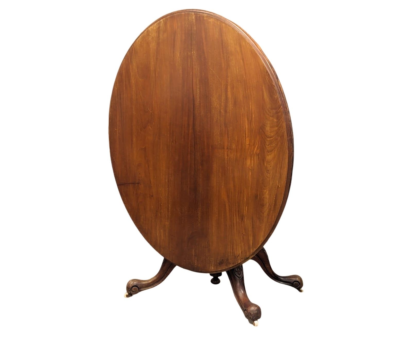 A mid 19th Century mahogany breakfast table on cabriole legs, 133cm x 103cm x 69cm - Image 6 of 7