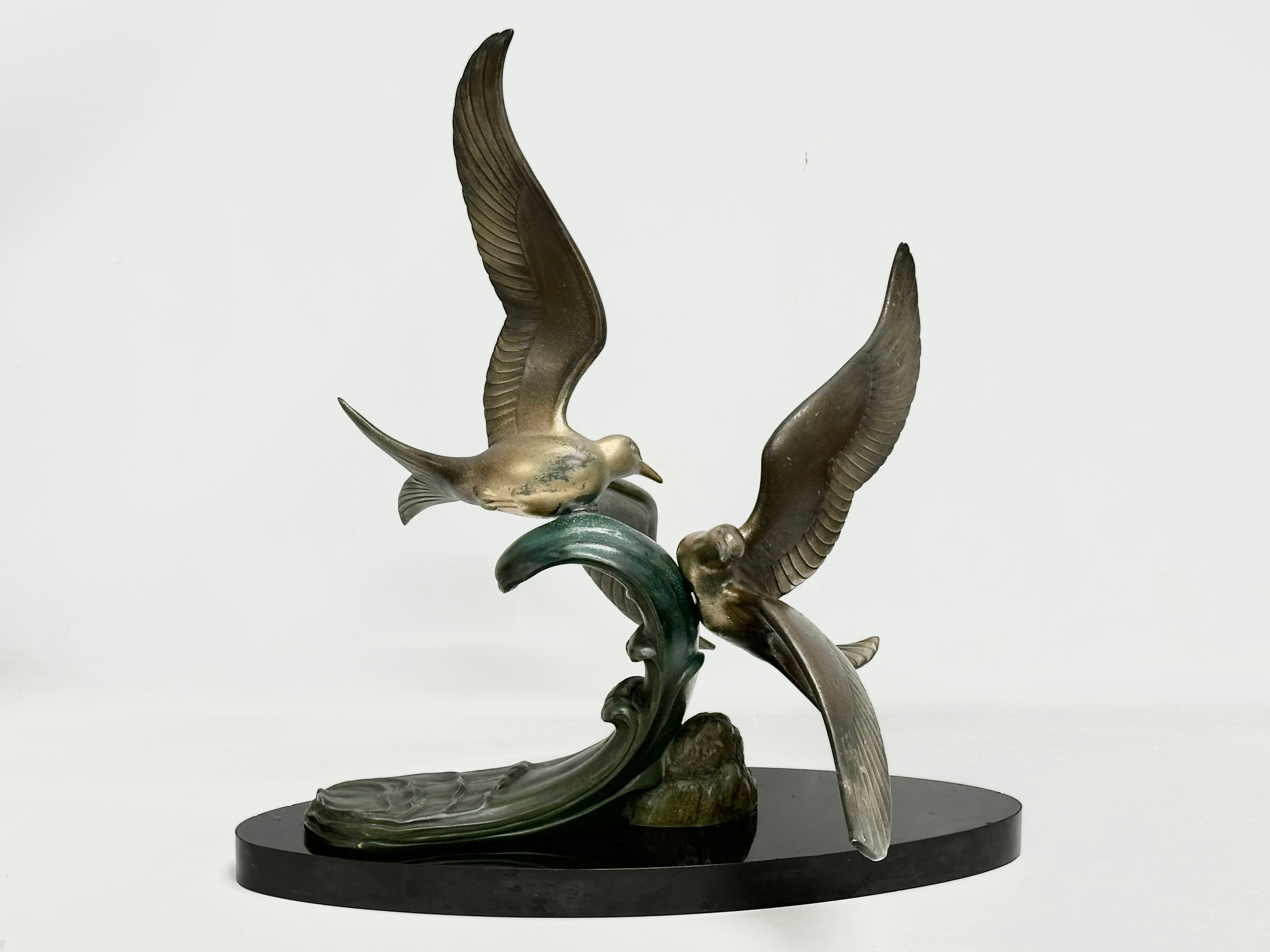 A large 1920’s Art Deco ‘Paradis’ spelter figure on slate base. 47x45x50cm