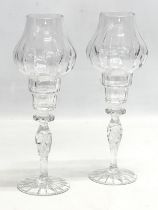 A pair of tall crystal tea lights. 30cm