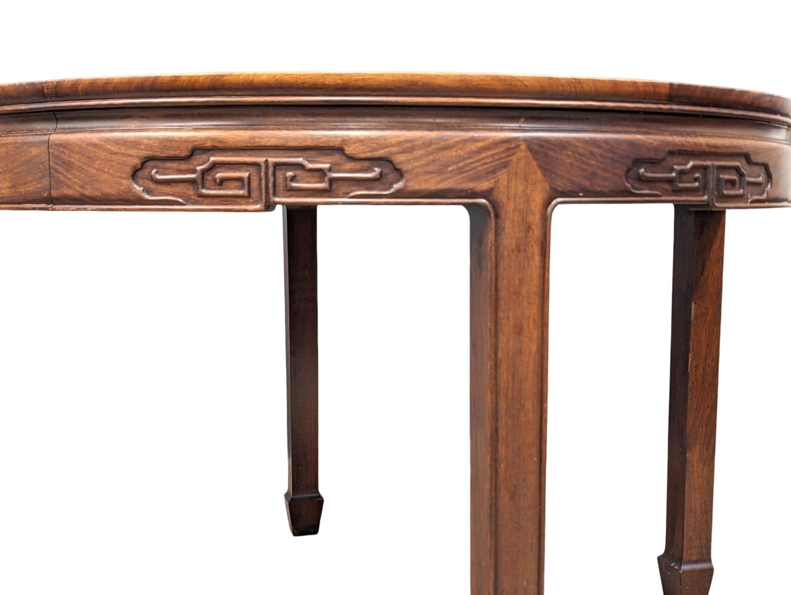 A Chinese rosewood 2 leaf extending dining table and 6 chairs with Mother of Pearl inlay. - Image 6 of 11