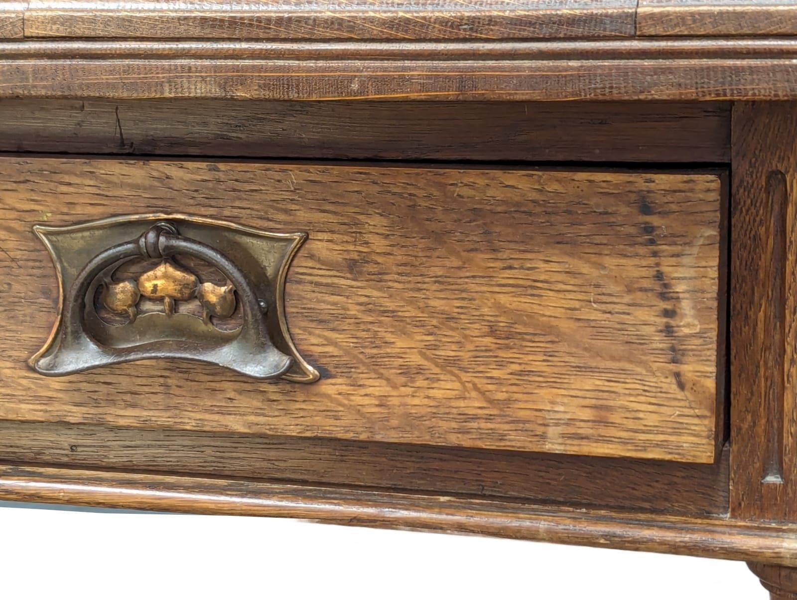 A Late 19th Century oak side table with drawer as copper Art Nouveau handles. 98x65x76cm - Image 2 of 5