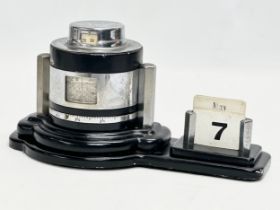 An Art Deco ‘Unigraph’ barometer and thermometer. 1920/1930. 26x14x13cm
