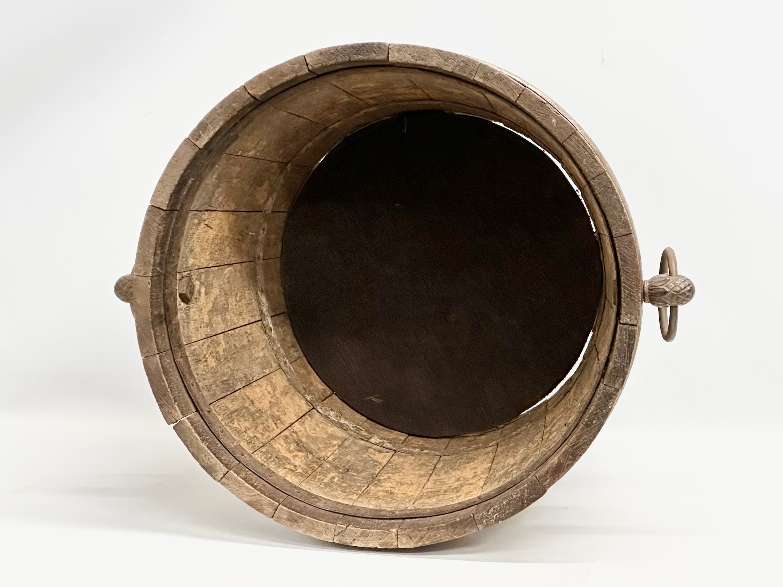 A large Late 19th Century oak coal bucket with large drop ring handles. Circa 1880-1900. 53x45x43. - Image 6 of 6