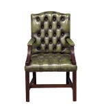 A George III style deep button leather Gainsborough armchair.