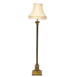 A tall brass standard lamp with Corinthian pillar. 163cm