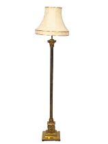 A tall brass standard lamp with Corinthian pillar. 163cm