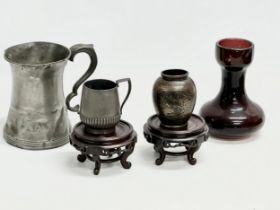 A job lot. A Late 19th Century Hyacinth vase. A large Victorian pewter tankard and other. A pair