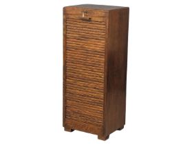 An early 20th century oak filing cabinet with shutter door and door, 46cm x 38cm x 116cm