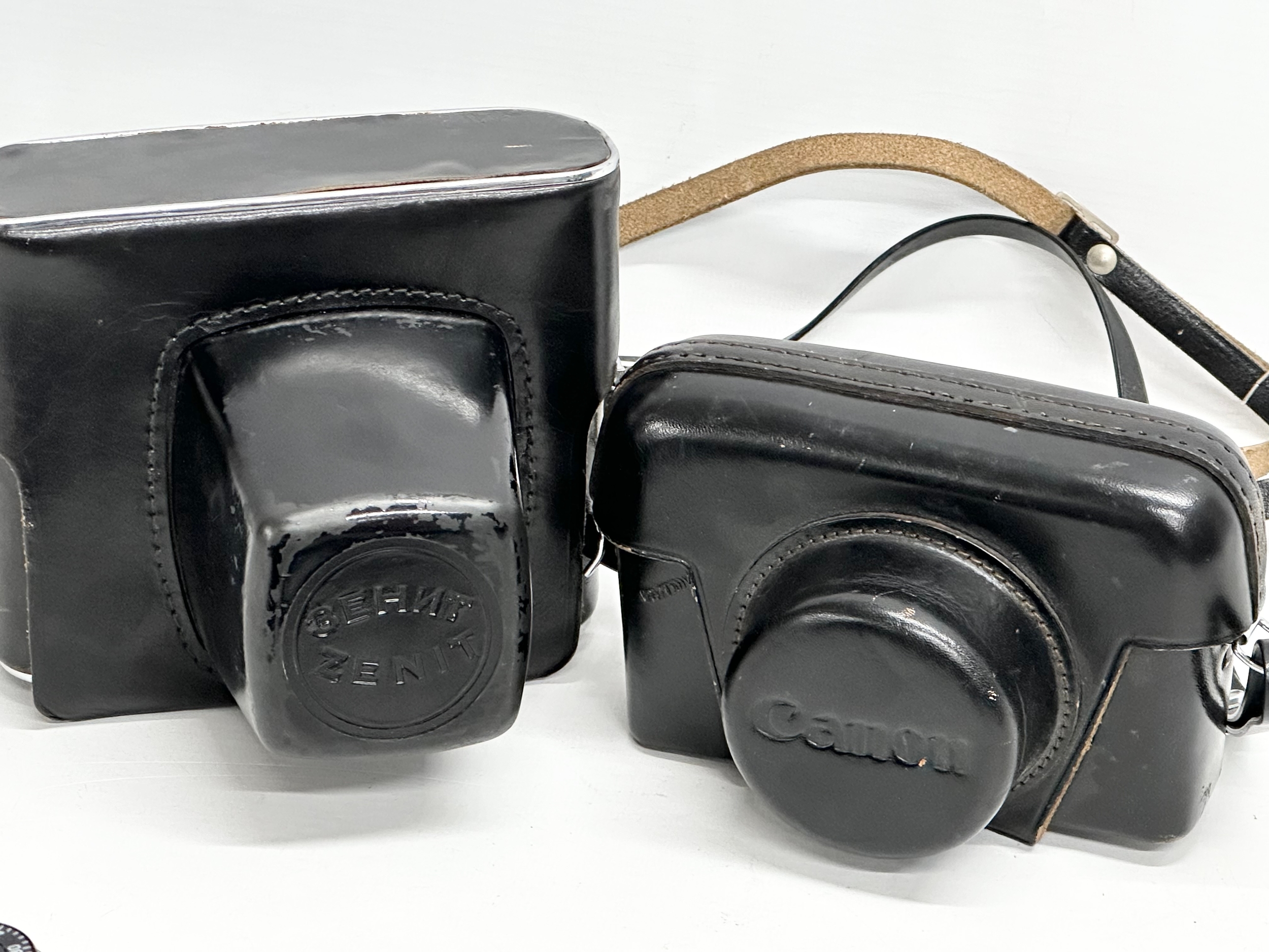 2 vintage cameras. A Zenit EM camera with case and a Canon Canonet Junior camera with case. - Image 4 of 4