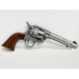 A good quality replica 45 caliber revolver. Single Action Army 45.