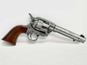 A good quality replica 45 caliber revolver. Single Action Army 45.