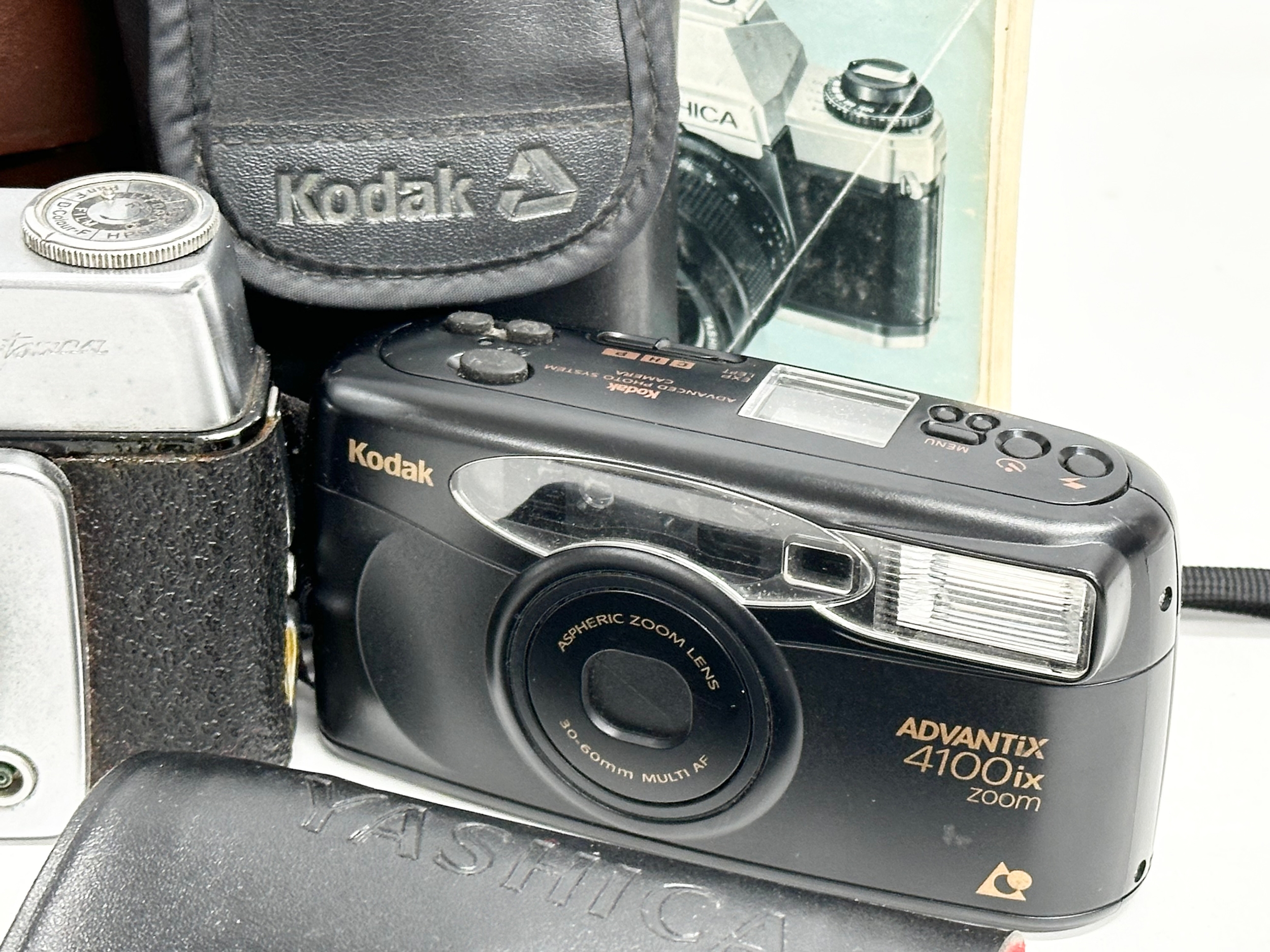 A collection of cameras. Topcon RM300 with case. Ilford Sportman camera with case. Kodak Advantix - Image 4 of 4