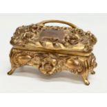 A brass Rococo style jewellery casket by B&W. Early/Mid 20th Century. 22x10x12cm