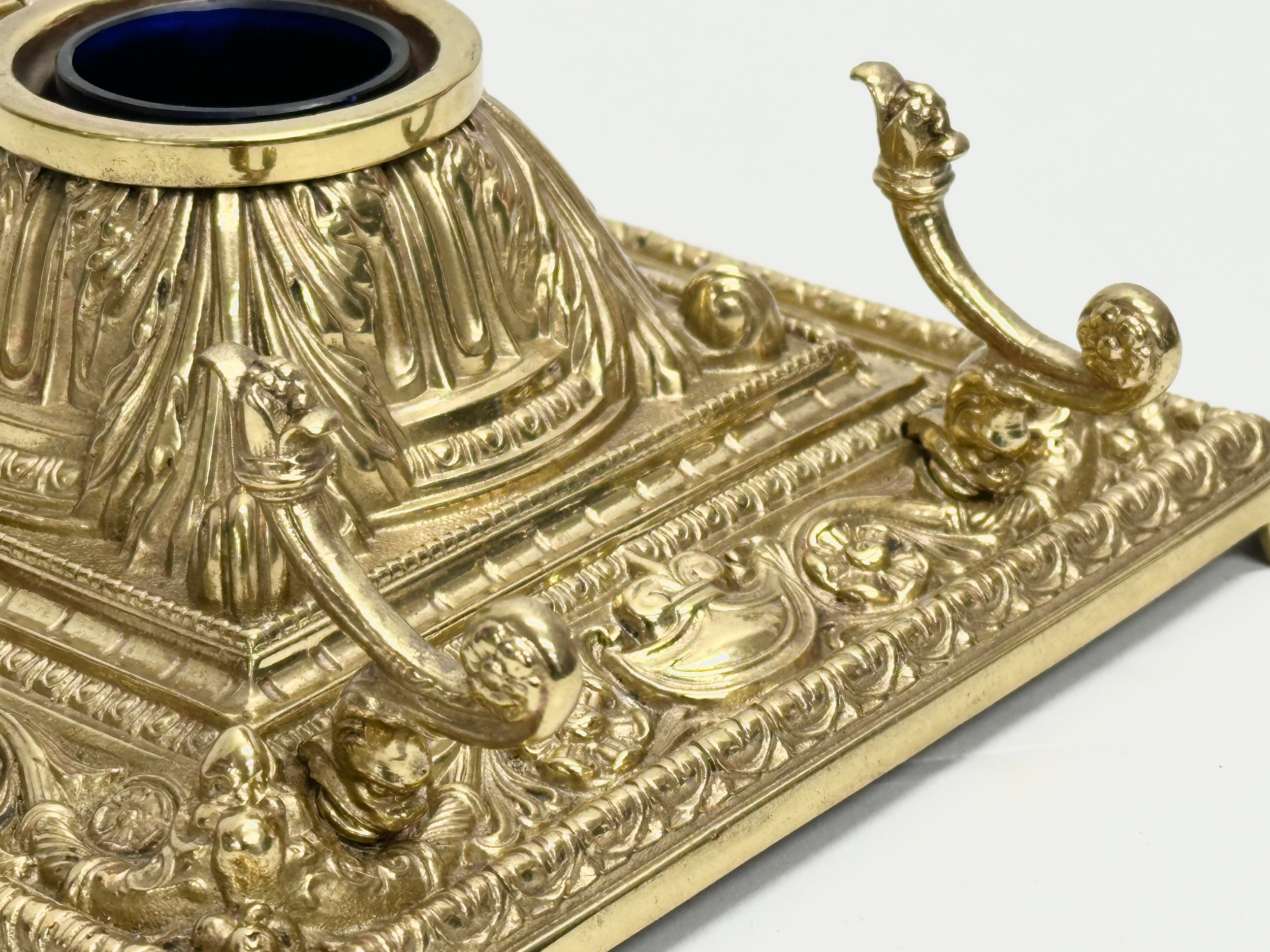 A Late 19th Century Victorian brass inkstand/inkwell with original Bristol Blue liner. 18.5x18. - Image 3 of 6