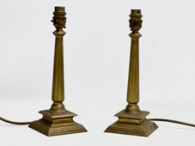 A pair of vintage heavy brass table lamps. 29cm
