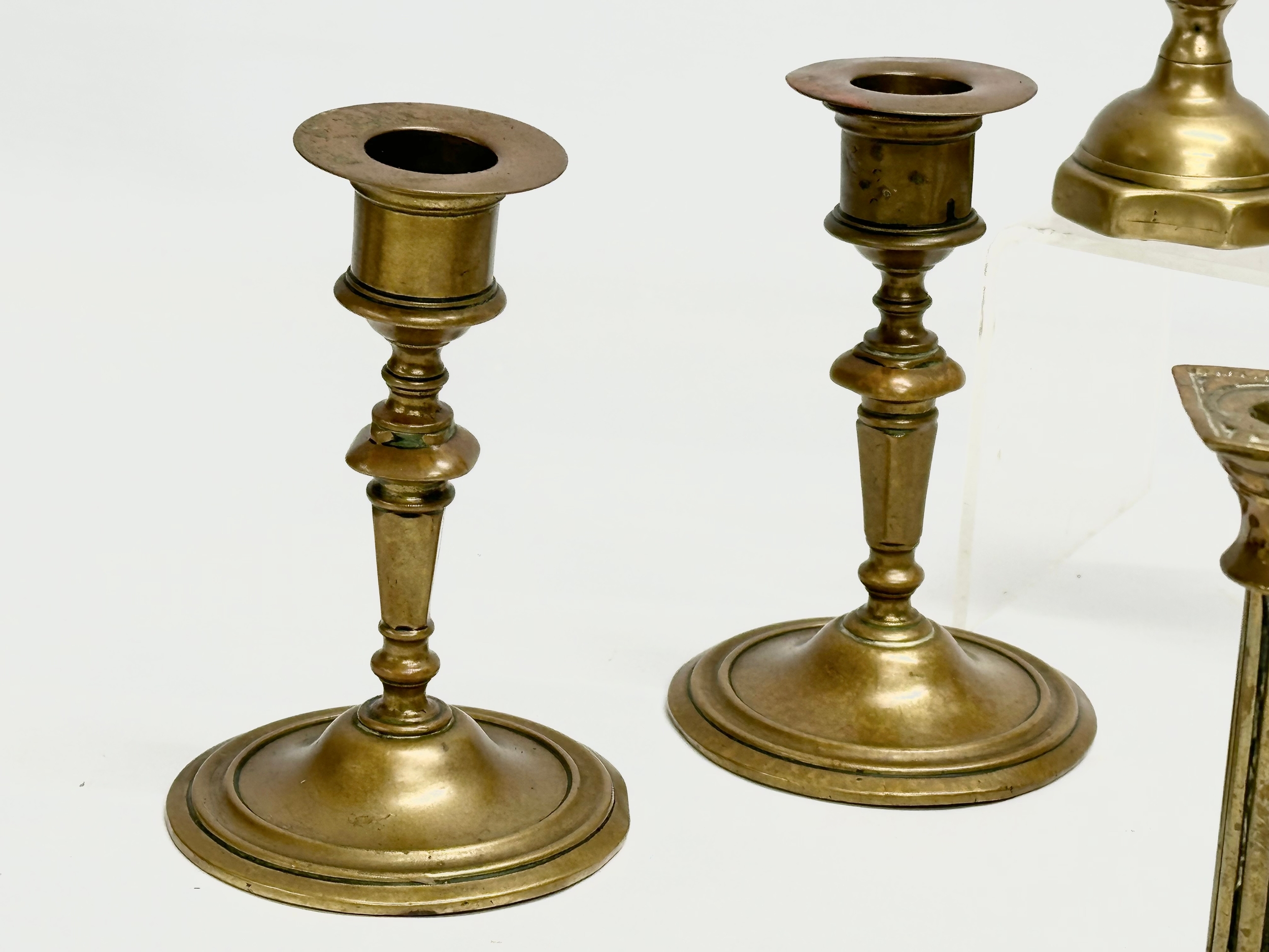 5 sets of Victorian brass candlesticks. 3 pairs and 2 sets of 4. 12cm, 11cm, 11.5. 6cm - Image 4 of 5