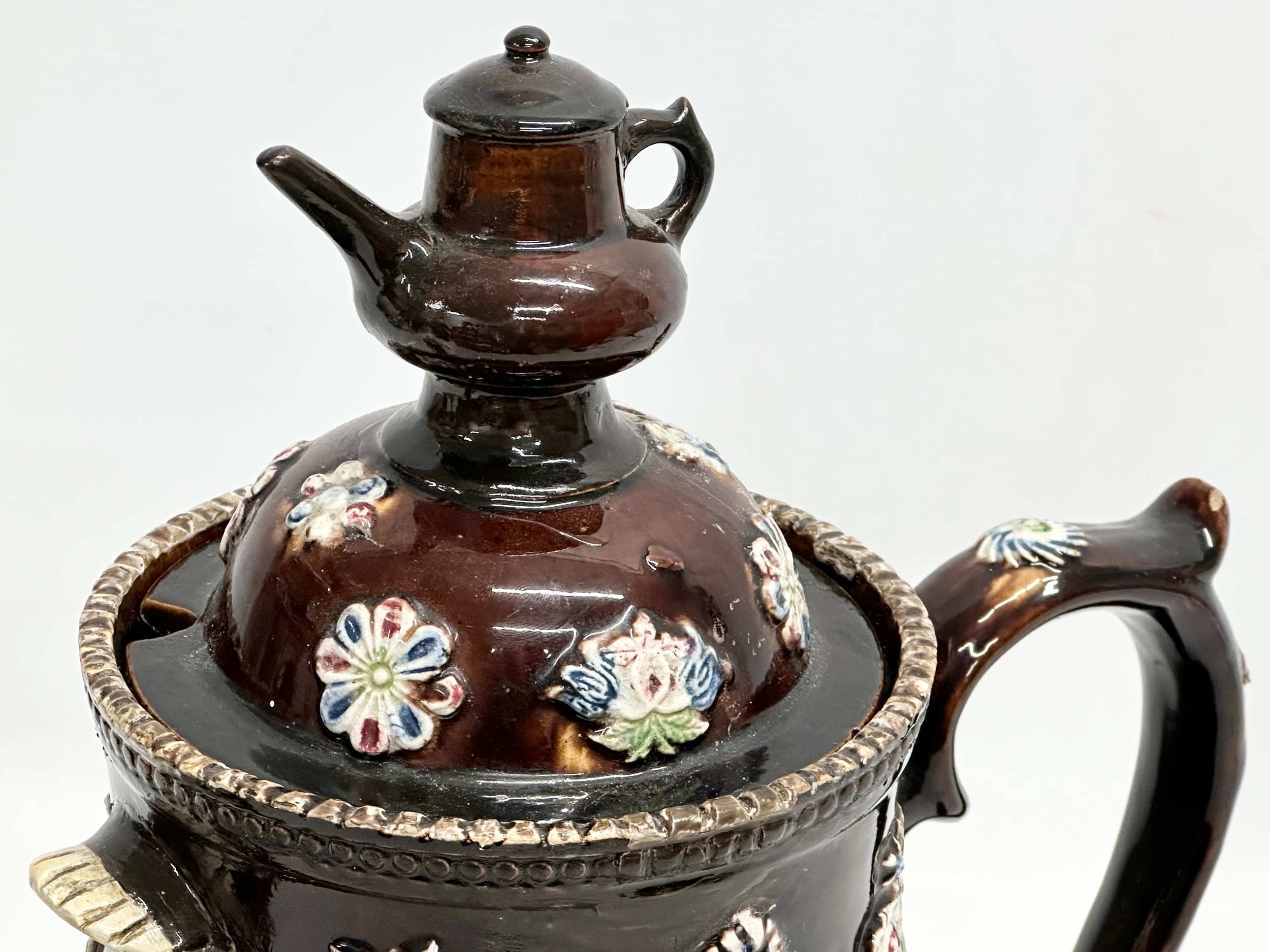 A large Late 19th Century Measham Pottery ‘Bargeware’ teapot. Circa 1880-1890. Forget Me Not. - Image 3 of 8