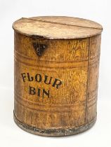 A large Late 19th Century flour bin with scumble work finish simulating wood. 44x45x50cm