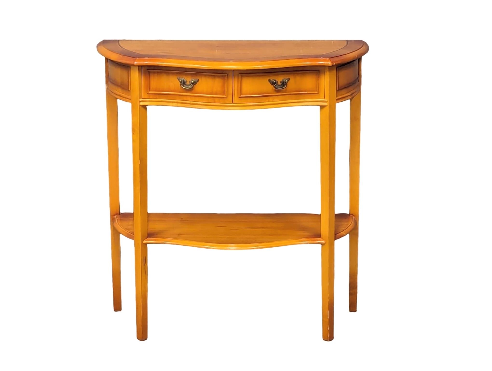 A yew wood Serpentine front hall table with 2 drawers. 72x35x75xm
