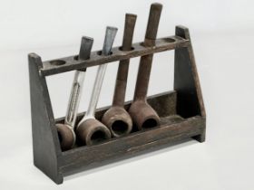 A Late 19th/Early 20th Century pipe rack with smokers pipes. 21x14cm