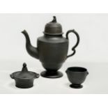 3 pieces of Late 18th/Early 19th Century black Basalt pottery. An unmarked basalt coffee pot,