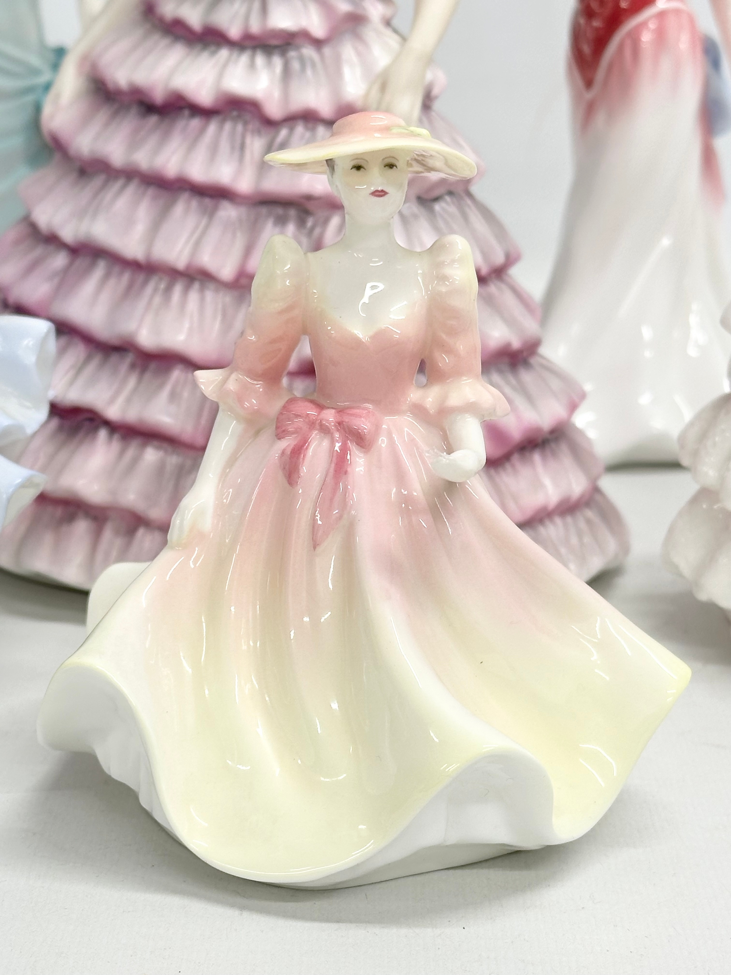 A collection of Royal Doulton and Coalport figurines. - Image 4 of 8