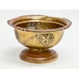 A Late 19th Century brass footed bowl. 16.5x9.5cm