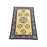 A vintage Middle Eastern hand knotted rug. 133x228cm