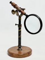 A desktop magnifying glass. 14x30cm