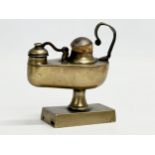A Late 19th/Early 20th Century ‘Roman Lamp’ table lighter. 9.5x10cm
