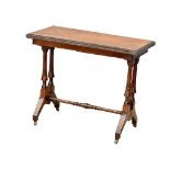 A Late Victorian oak turnover games table. 91x46x74cm