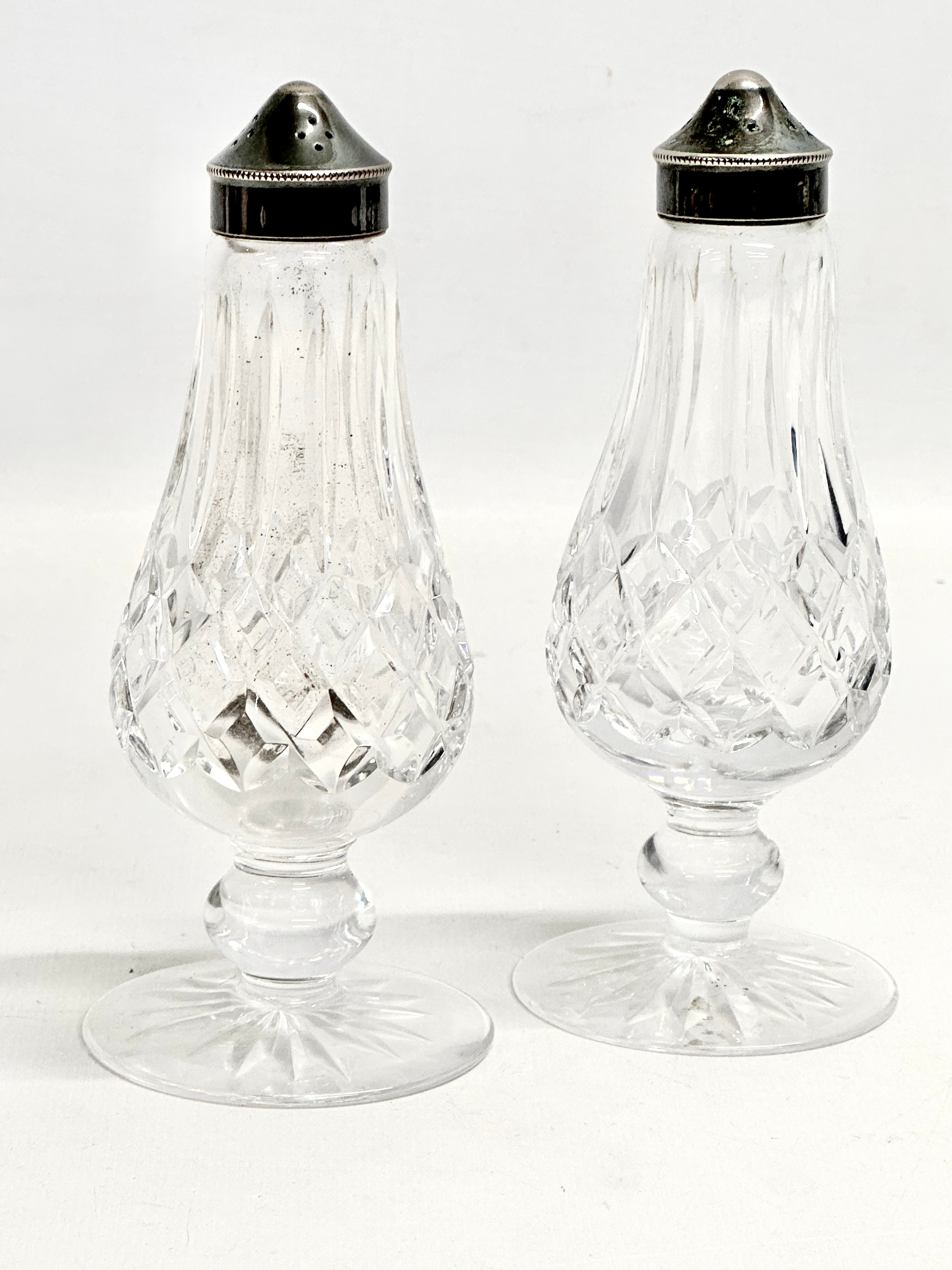 A pair of Waterford Crystal ‘Lismore’ salt and pepper shakers. 15.5cm