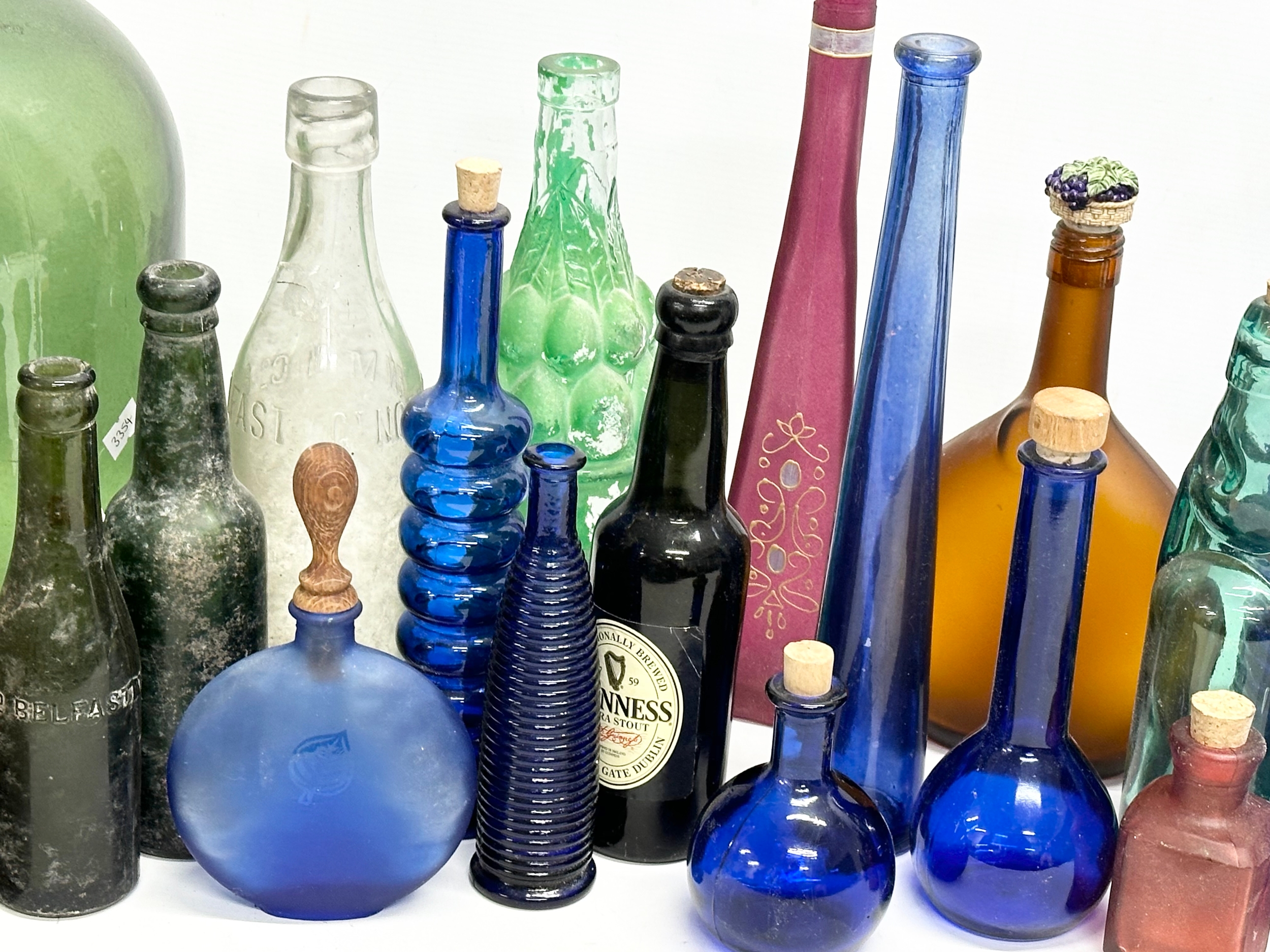 A collection of vintage glass bottles. Belfast water bottles, carboy etc - Image 4 of 7