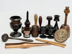 A collection of 19th Century Treen Ware. Salt shaker, egg cups, butter pat, pestle etc
